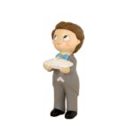 figura niño cojín con anillos